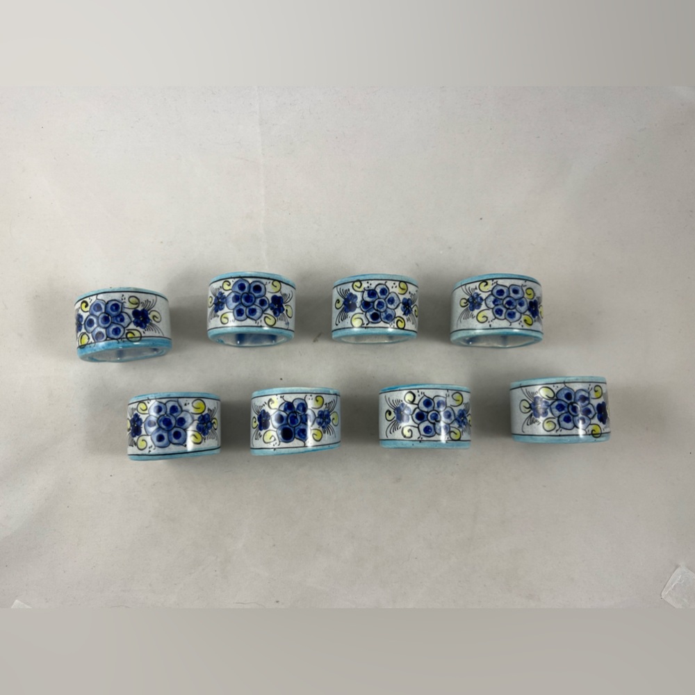 6 Tanala ceramic napkin rings blue white yellow floral motif folk art pottery